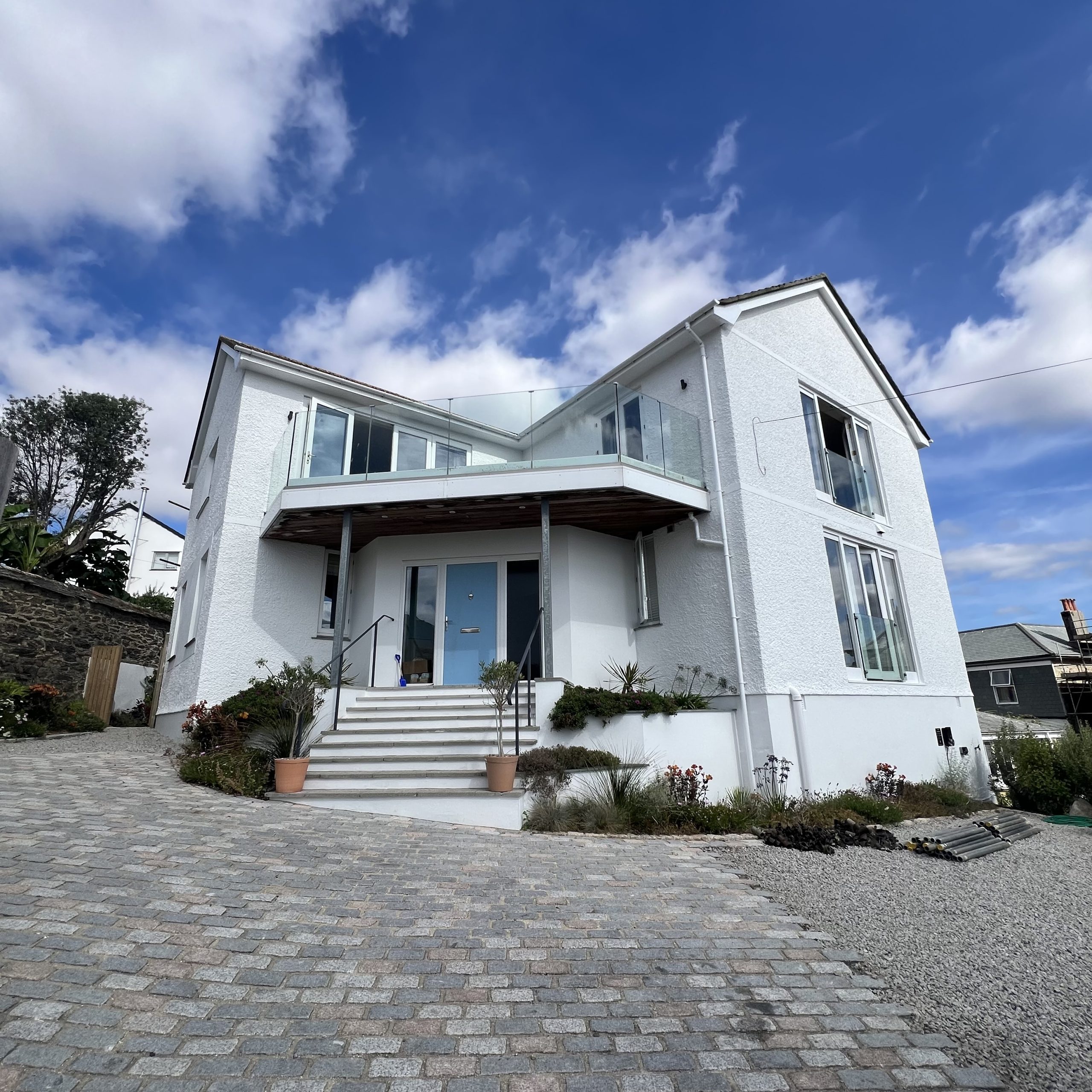Exterior masonry and woodwork painted this summer
