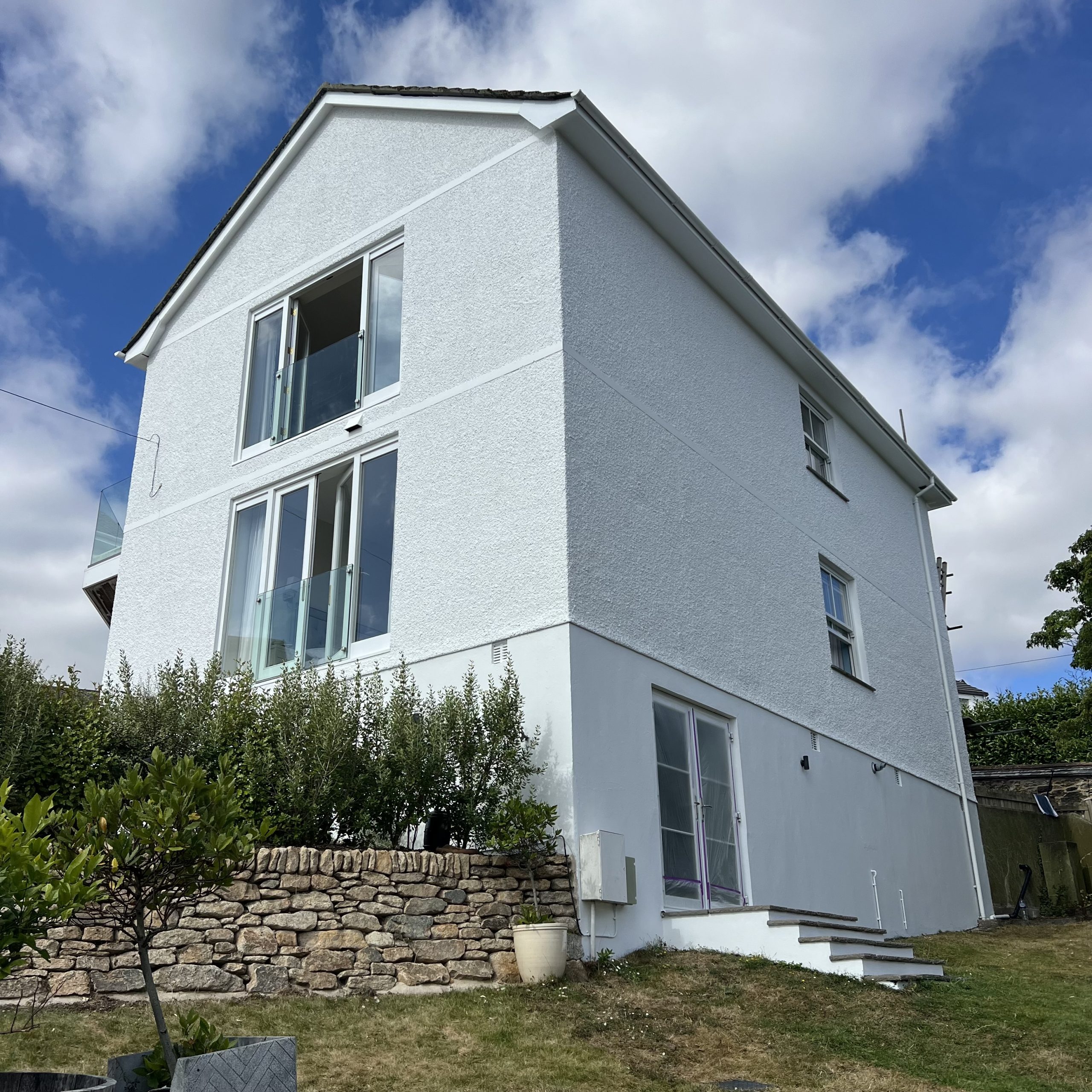 Exterior masonry and woodwork painted this summer